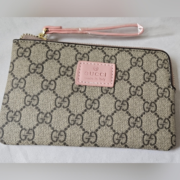 Gucci Handbags - New Gucci GG Supreme Monogram Zip Around Wallet Wristlet Pink Accents